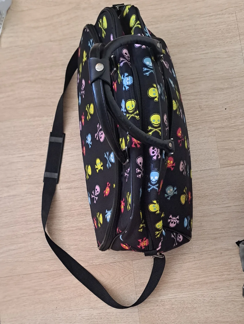 Skulls Design Black Duffel Bag with Multicolor Print